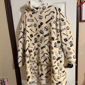 Cozy Cream Hooded Blanket with makeup print